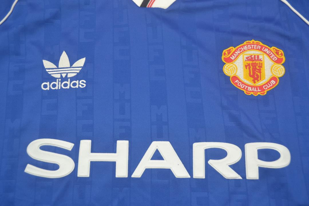 Maillot extérieur bleu Manchester United 88/90 "Augusto" N°8